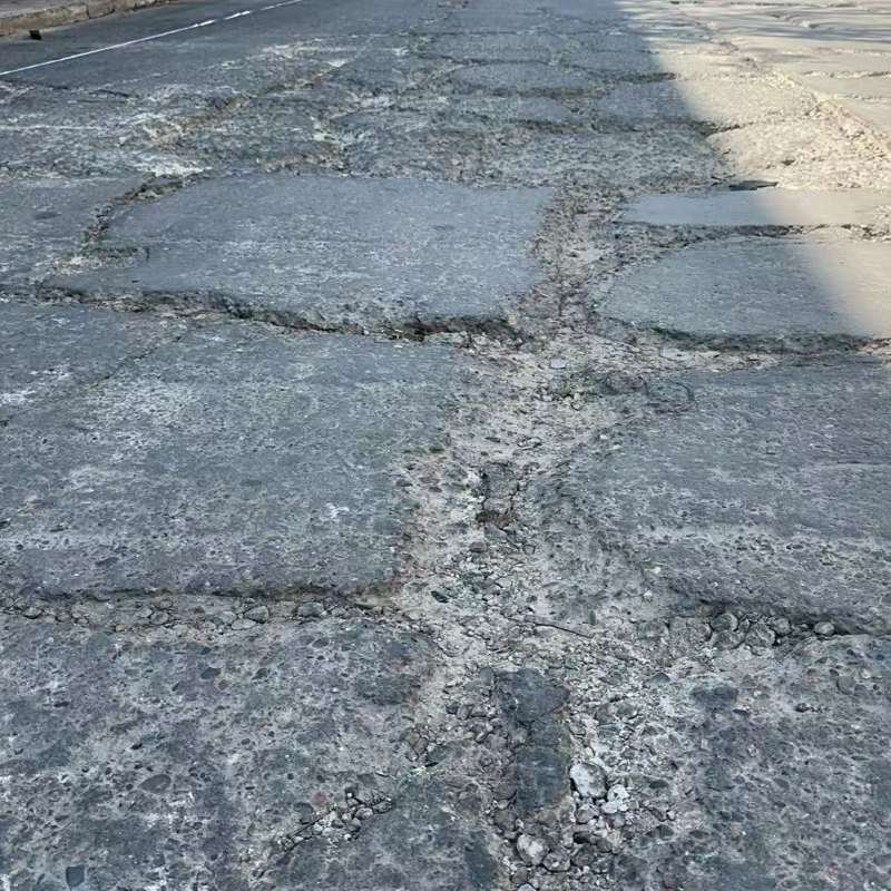 延川路面起砂露石子修补料